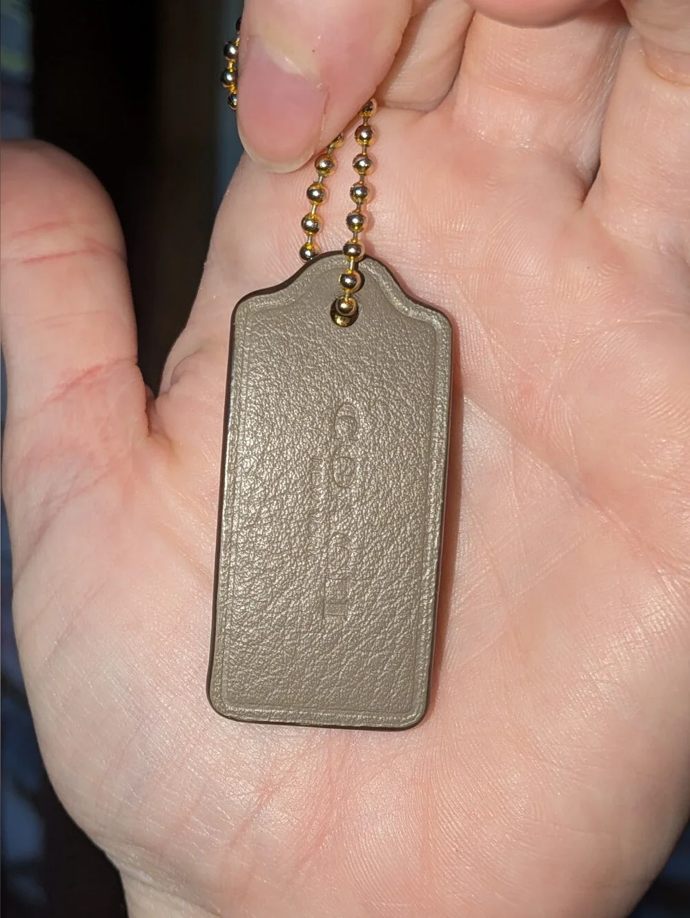Coach leather tag